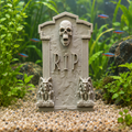 Headstone in a fish tank with mounting posts buried